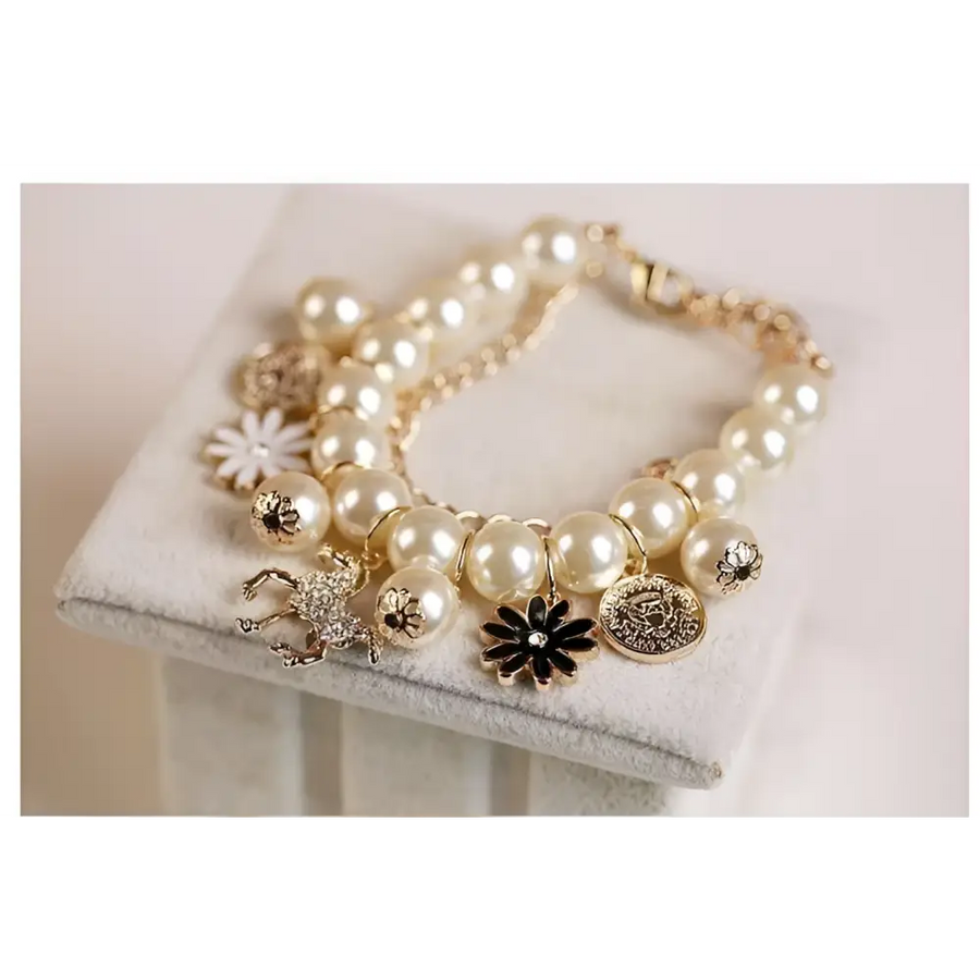 Marineparel Bloemen Armband met Gouden Paard Hangertje