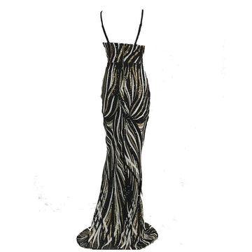 A black and silver sequined mermaid-style prom dress with thin spaghetti straps perfect for evening dress occasions