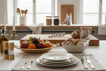 Gold-toned ornate bowl filled with fresh fruits from elegant dining sets enhancing your dining experience.