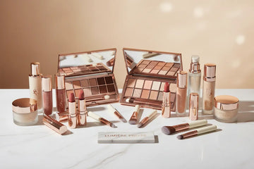 Rose gold-toned makeup palette with mirrored lids featuring neutral eyeshadow shades from RoyalEssenceLux makeup collection.