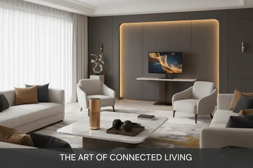 Modern minimalist living room with dark gray accent wall and illuminated tv frame featuring royalessencelux smart home devices.