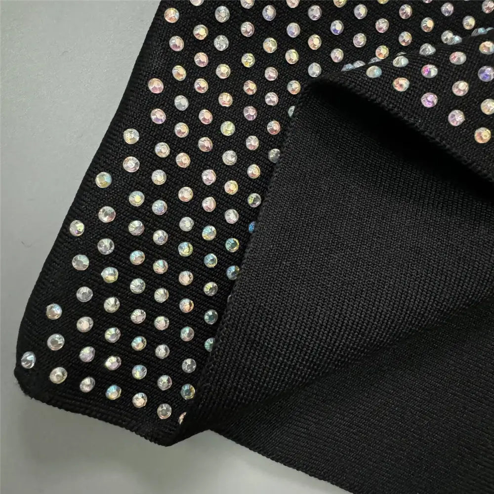 black fabric sexy rhinestone bandage long sleeve mini dress adorned with a dense pattern of iridescent rhinestones ideal for dress cross border and cross border foreign use