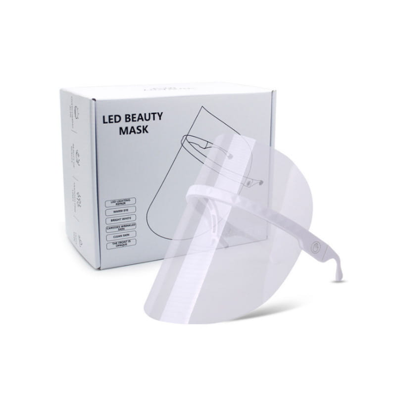 White transparent led beauty mask with a sleek curved design and adjustable headband used as a multifunctional facial massager and lifting tool massager for facial beauty.