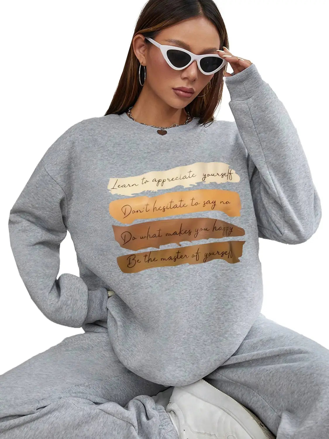 Gray solid colour long sleeve sweatshirt with beige and brown motivational phrases printed on horizontal stripes designed for daily wear.