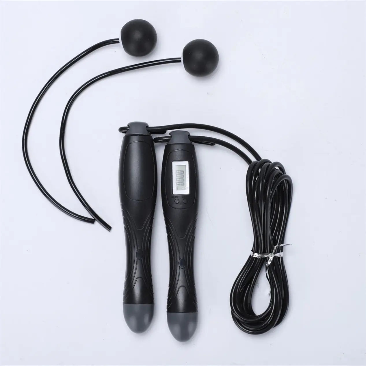 Black cordless electronic skipping rope featuring textured grips and spherical handles designed for effective skipping rope workouts.