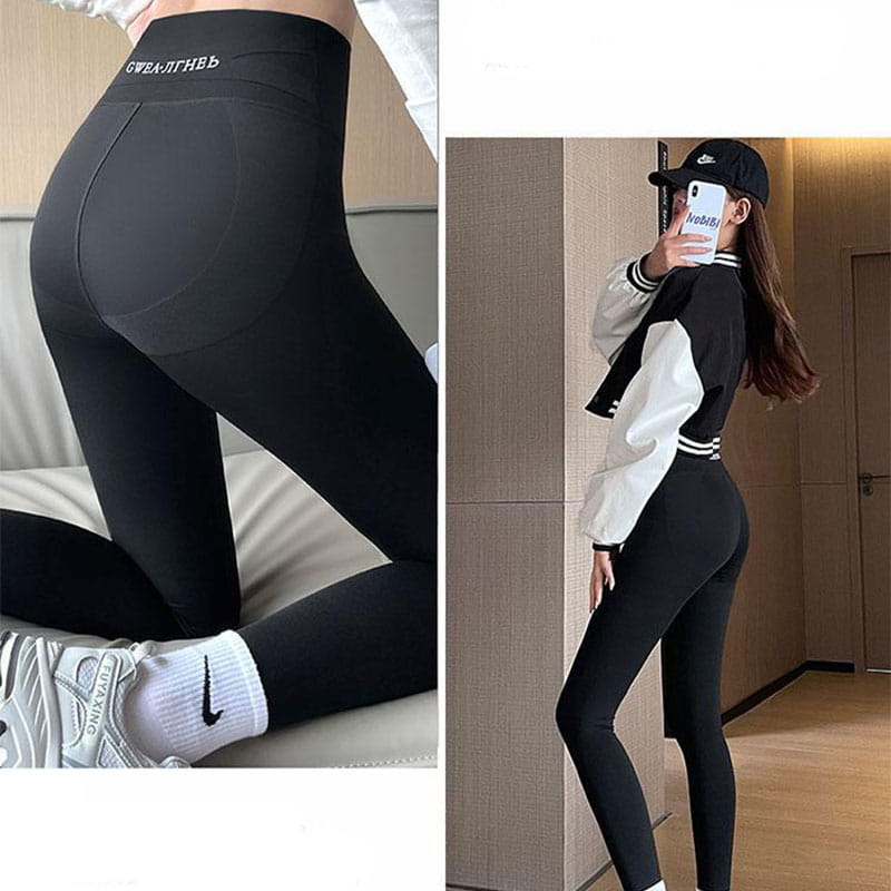 black fleece thickened winter shark pants high waist leggings with smooth form-fitting material and subtle branding on the waistband