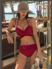 red split bikini solid color swimsuit with matching hat displayed on white background