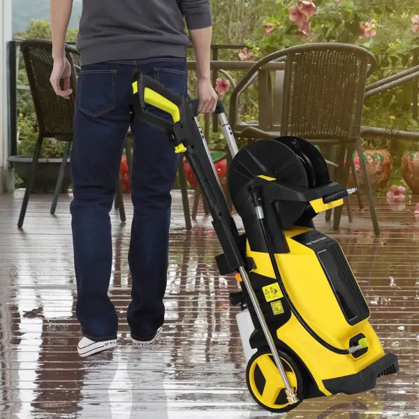 Yellow and black kärcher high pressure cleaning machine with coiled hose reel handle and wheels for efficient pressure cleaning.