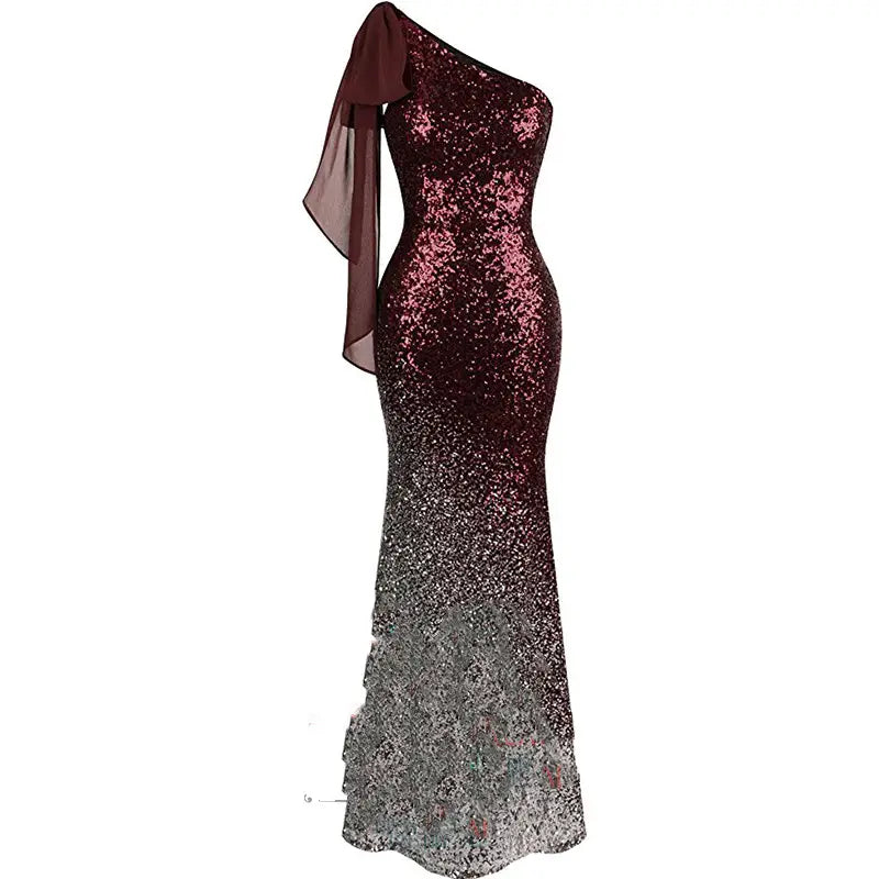 a shimmering burgundy to silver rose gold ombre one shoulder fishtail sequin evening dress with a sheer draped overlay and slim fit mermaid silhouette