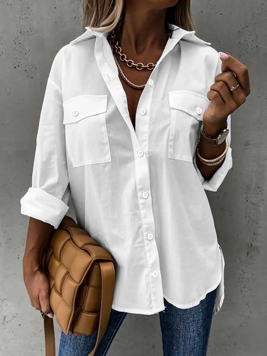 white button-up shirt with two chest pockets and rolled sleeves showcasing a long sleeve lapel design for a loose long sleeve look