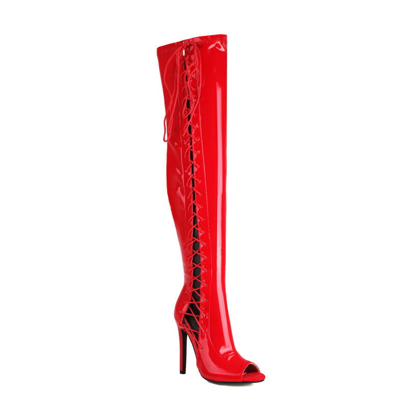 vibrant red patent leather female over the knee boots with lace-up detailing, peep-toe design, and moderate heel height.