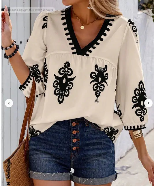 Cream-colored casual vacation shirt with black embroidered floral patterns and a v-neckline suitable for holidaya random print styles.