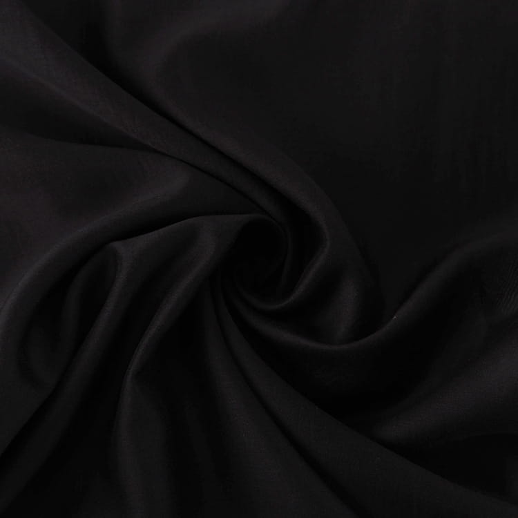 black satin high waist slit sheath skirt with a smooth glossy finish and gentle folds