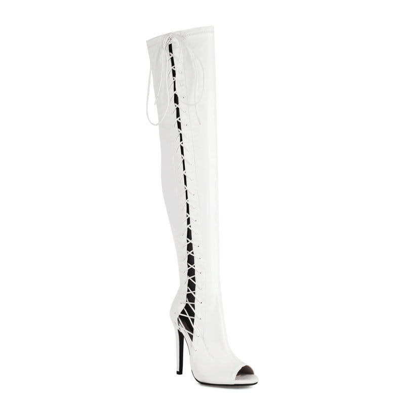 White patent leather female over-the-knee boots with lace-up detailing and peep-toe design highlighting stylish heel height.