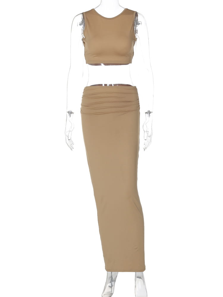 Tan two-piece set featuring women tank tops long with a solid color cropped top and high-waisted pencil skirt with ruched detailing at the waist.