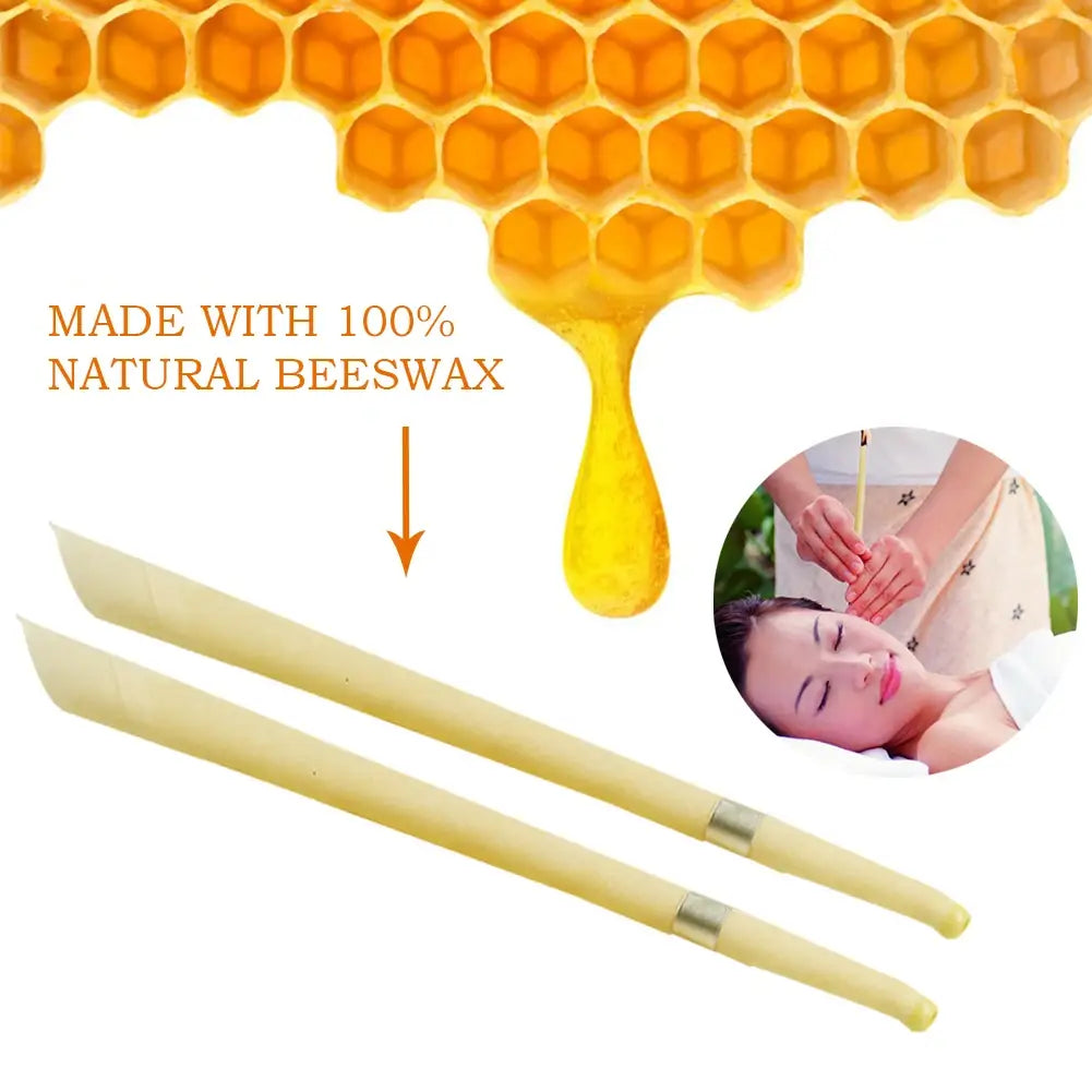 Two pale yellow coning beewax natural ear candles with metallic silver bands near the handles for ear healthy care and wax removal.