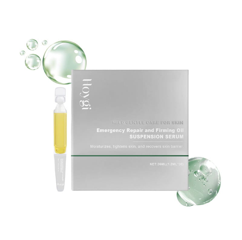Silver rectangular box for hoygi emergency repair and firming oil suspension serum with a single ampoule of golden-yellow anti aging tightening liquid beside it.