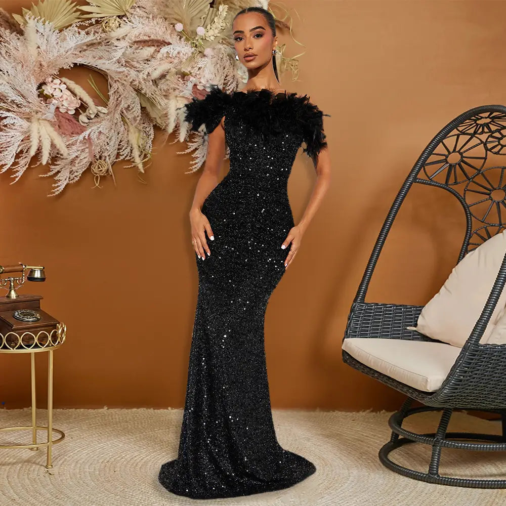 a shimmering black paillette feather stitching mermaid gown with feather stitching sequin off-the-shoulder straps for evening wear