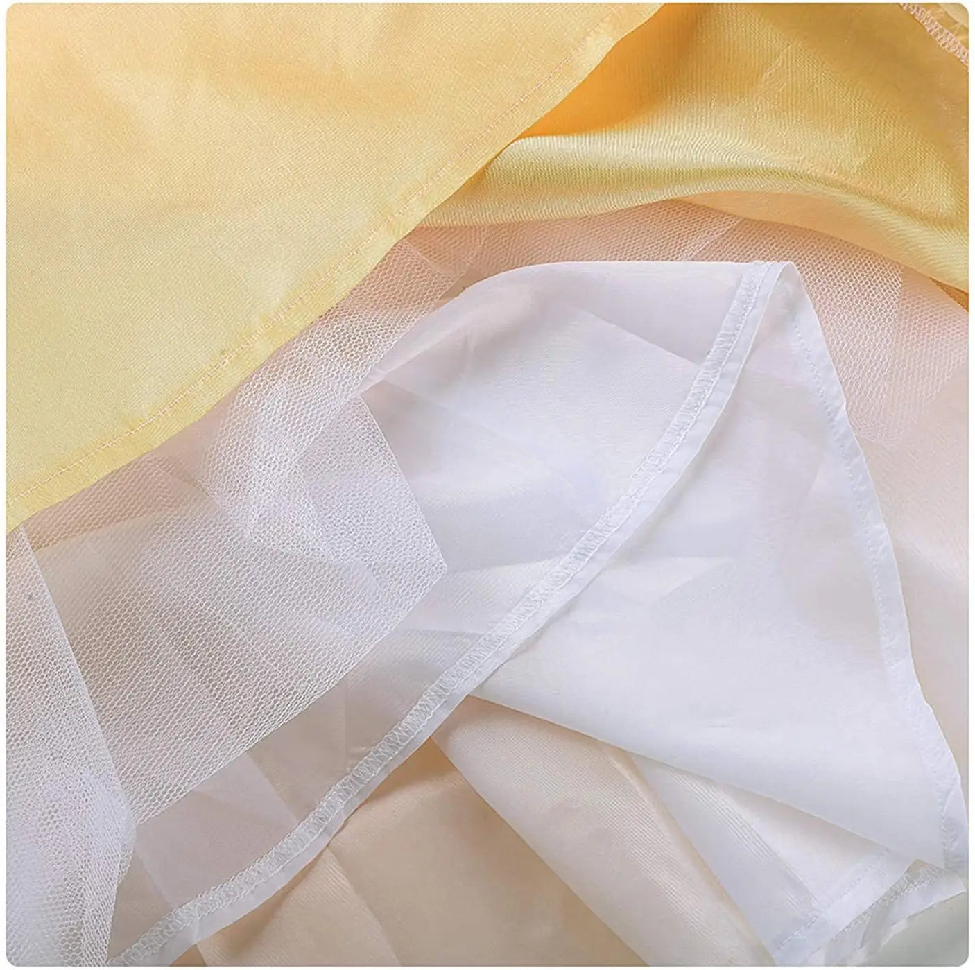 a yellow victorian palace dress stage performance costume featuring a delicate white tulle overlay with a subtle sheen layered over soft yellow satin fabric