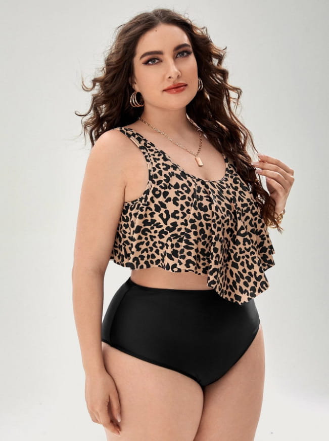 leopard print swimsuit tankini featuring a ruffled crop top with a flattering v-neckline and adjustable straps paired with high-waisted black swim bottoms