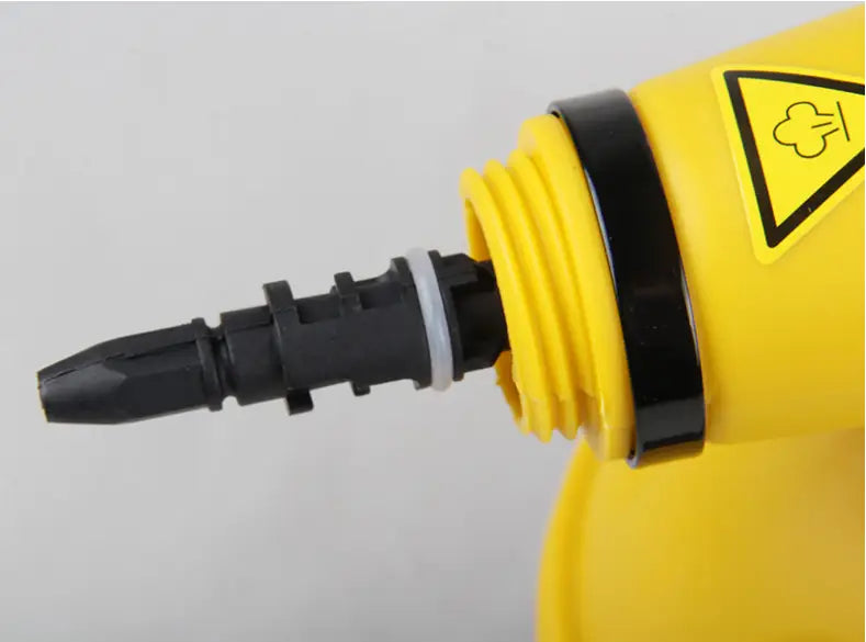 yellow plastic steam cleaner nozzle with black threaded connector and warning label for handheld steam cleaner with flexible nozzle in yellow and black color box