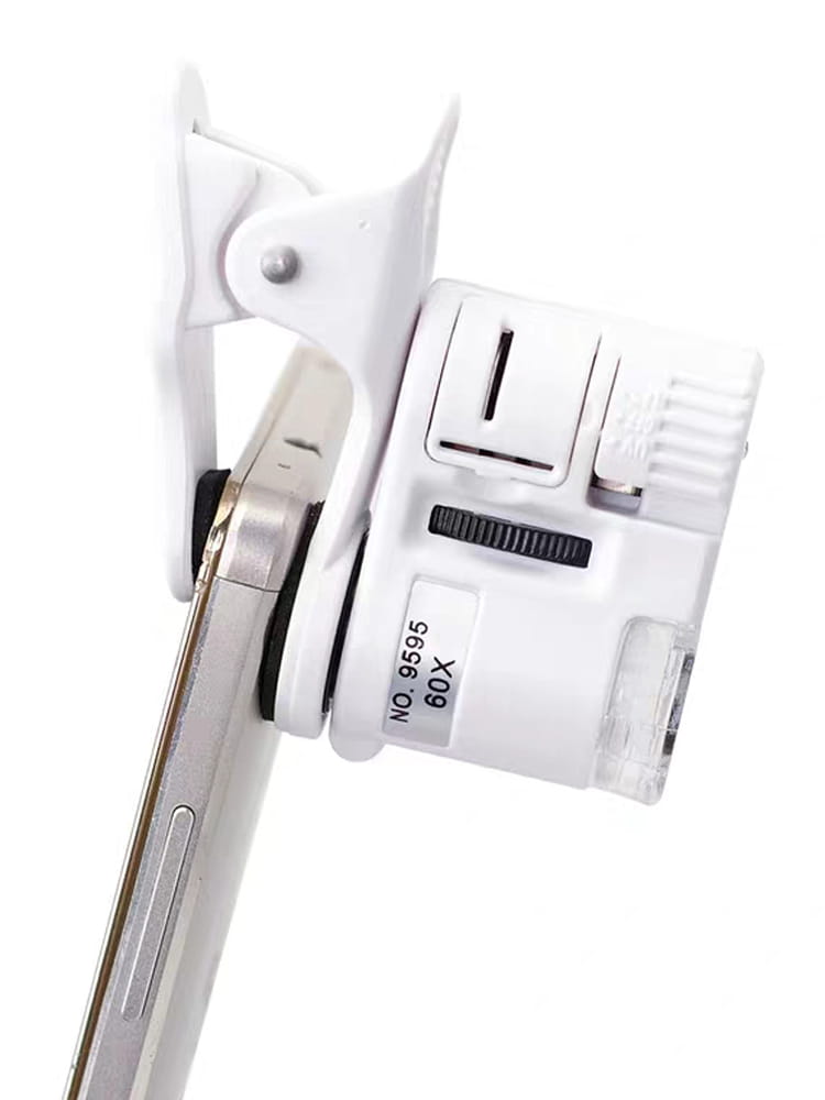 white plastic clip-on magnifier with 60x zoom featuring a black adjustment dial and focus control switch for use with a digital microscope camera with led light