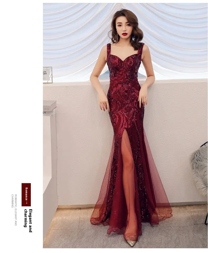 a deep red fishtail long summer sequins sling evening dress featuring a form-fitting silhouette with intricate beaded embroidery and a sheer overlay