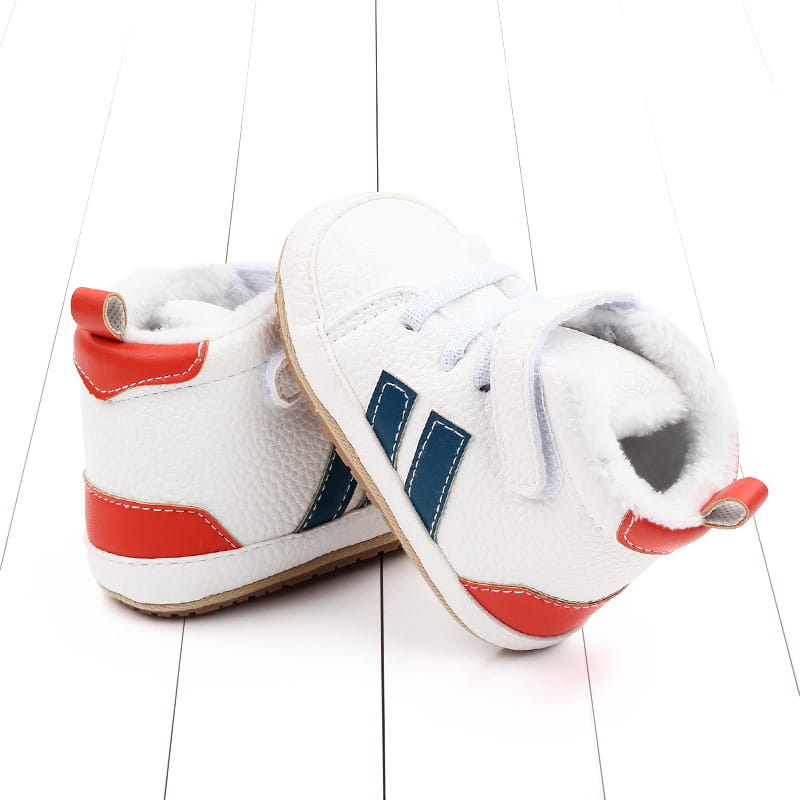 white baby shoes with red and navy blue accents featuring soft fleece lining velcro straps and sports soft-sole cotton material designed for comfort