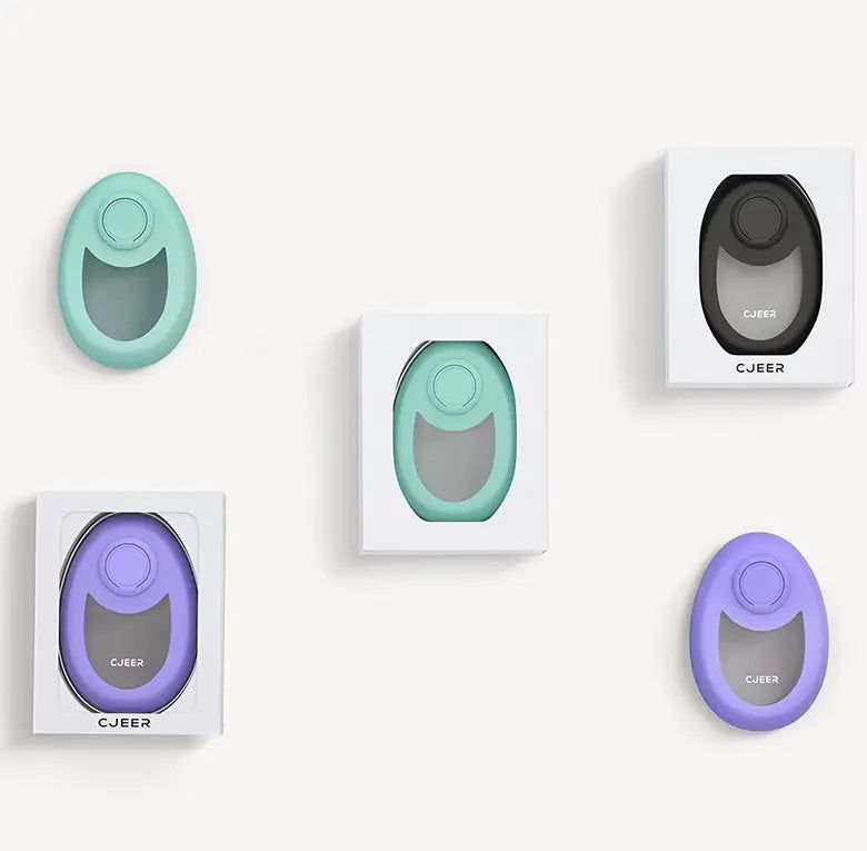 Cjeeer brand phone grip in mint green black and purple silicone with a circular top button designed for use with the teal nano glass crystal hair eraser removal tool for effective hair removal and crystal hair care.