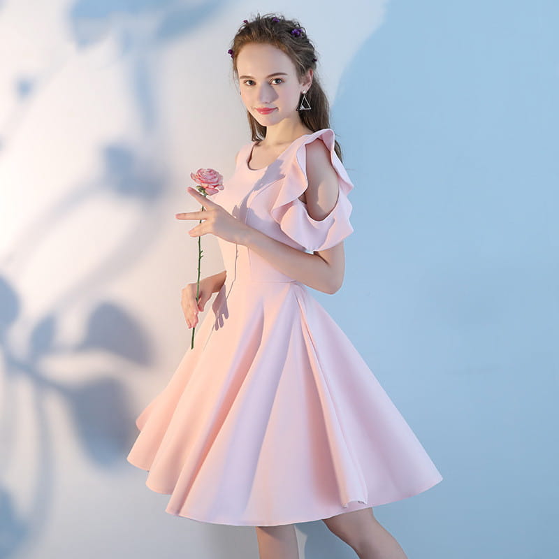 A soft pink short sisters off shoulder ruffled dress made of satin-like main fabric with an a-line silhouette and flared skirt.
