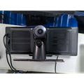 Black rearview camera with circular lens and mounting bracket for 10.26 inch car navigation with rear dual recording