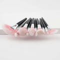 Set of eight pink and black professional makeup brushes with silver ferrules from the 10 piece purple gradient makeup set