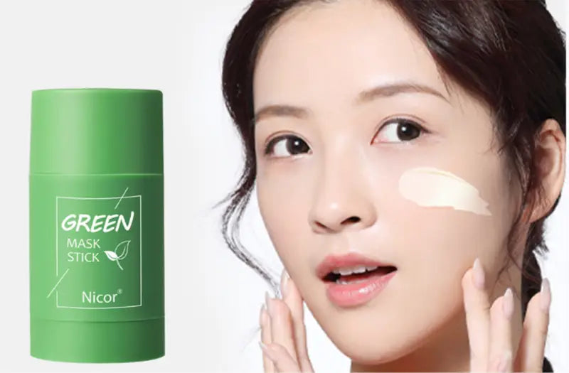 Green cylindrical nicor green mask stick with white label and leaf design for oil control cleansing green tea and eggplant mask stick.