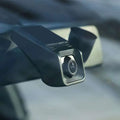 Black rectangular 1080p hd night vision driving recorder with metallic silver lens housing and concentric circular ridges for sleek angular design and parking surveillance