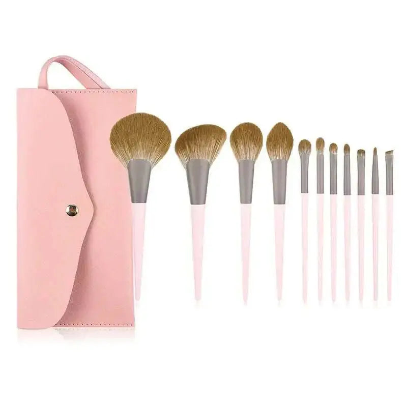 11 piece premium pink leather makeup brush set with soft golden brown bristles and sleek pastel pink handles