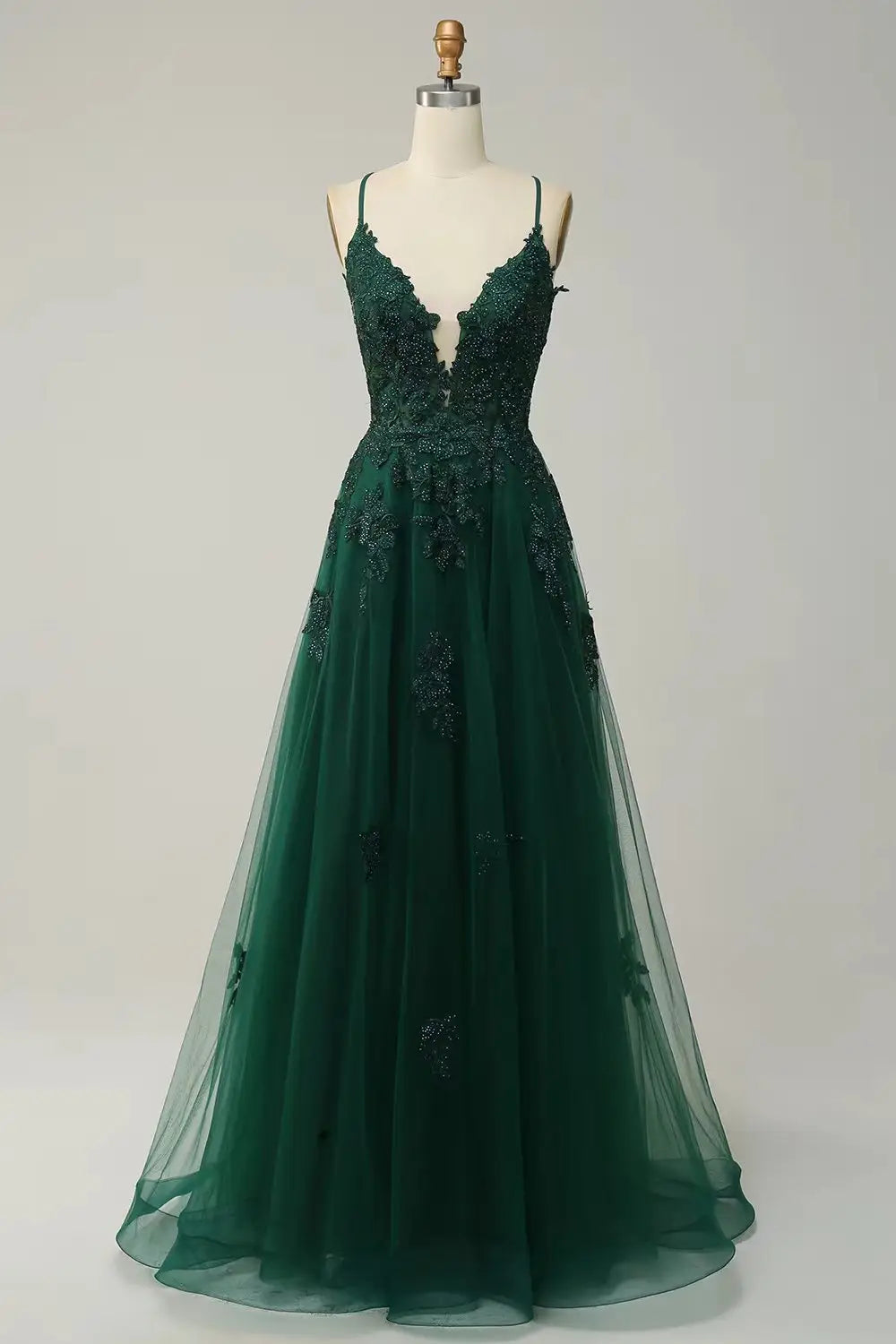 A picture color of a mint green lace women evening dress with slit made of emerald green lace and tulle featuring delicate floral embroidery suitable for elegant occasions.