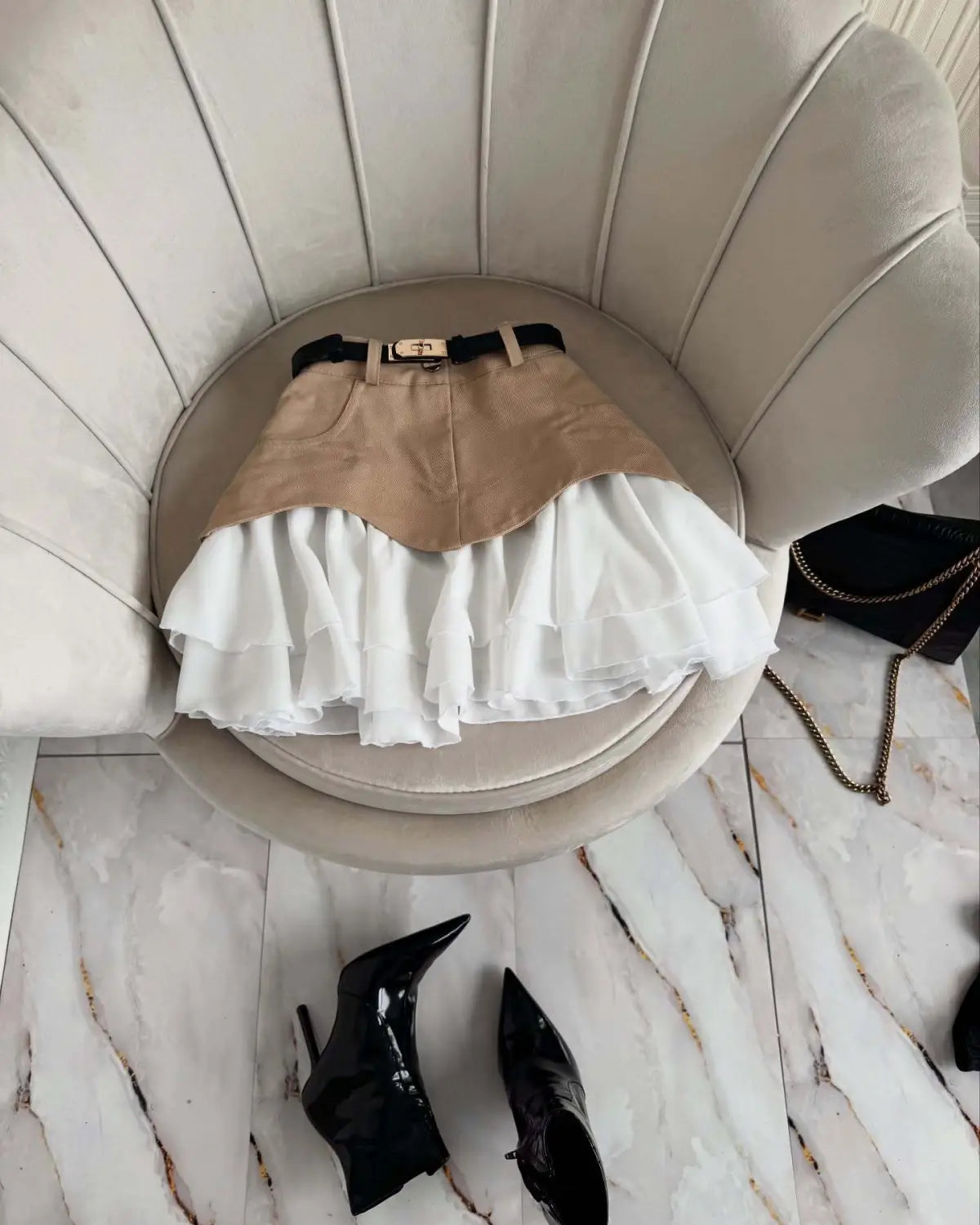 beige two tone ruffled high waist skirt featuring a structured suede-like top and a flowing sheer layered ruffle bottom in a high waist tiered skirt design