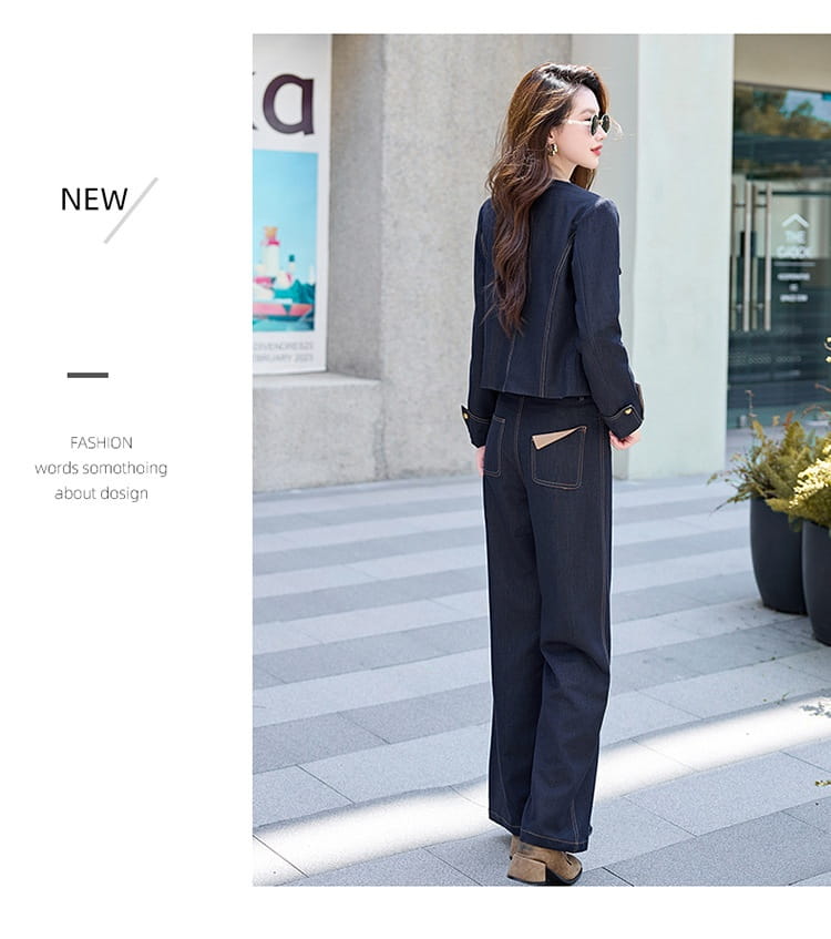 a sleek navy blue elegance retro casual two-piece suit featuring a tailored blazer and wide-leg trousers with subtle tan contrast stitching on the pockets