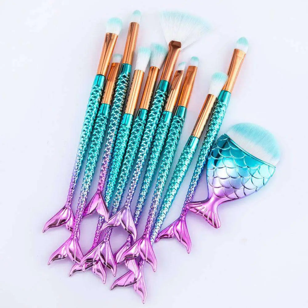 11pcs mermaid makeup brushes kit featuring iridescent teal and pink scales with metallic copper ferrules and fish palette