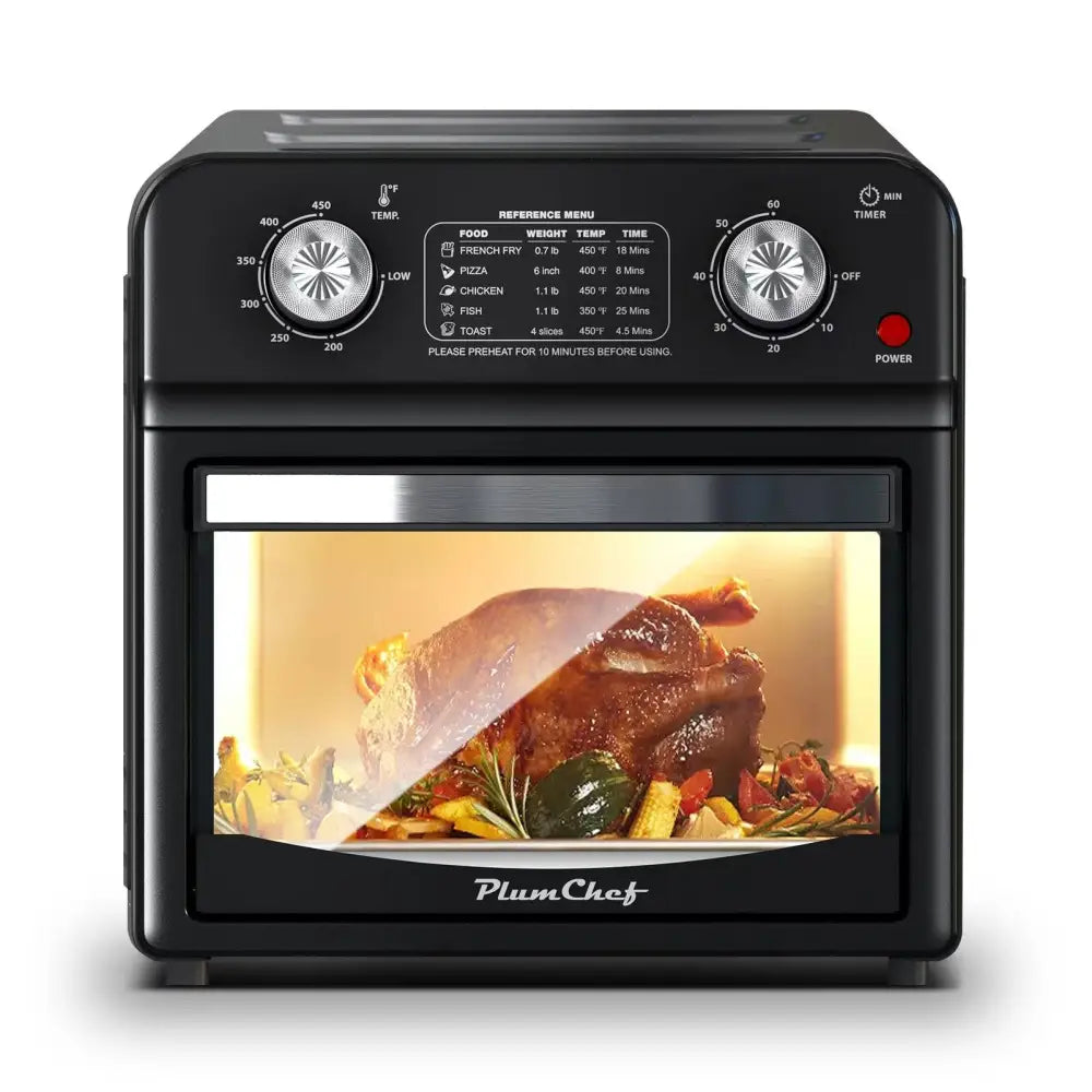 Black plumchef 12 liter air fryer oven with dual knob control and glass door roasting turkey and vegetables inside