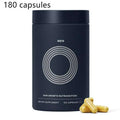 Dark blue cylindrical container labeled men hair care with silver design containing 180 golden hair care capsules