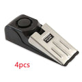 Black plastic burglar alarm wedge door stop with 120db electronic burglar alarm and built-in bell in black and silver