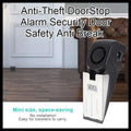 Black plastic 120db electronic burglar alarm wedge door stop with silver accents for anti-theft security