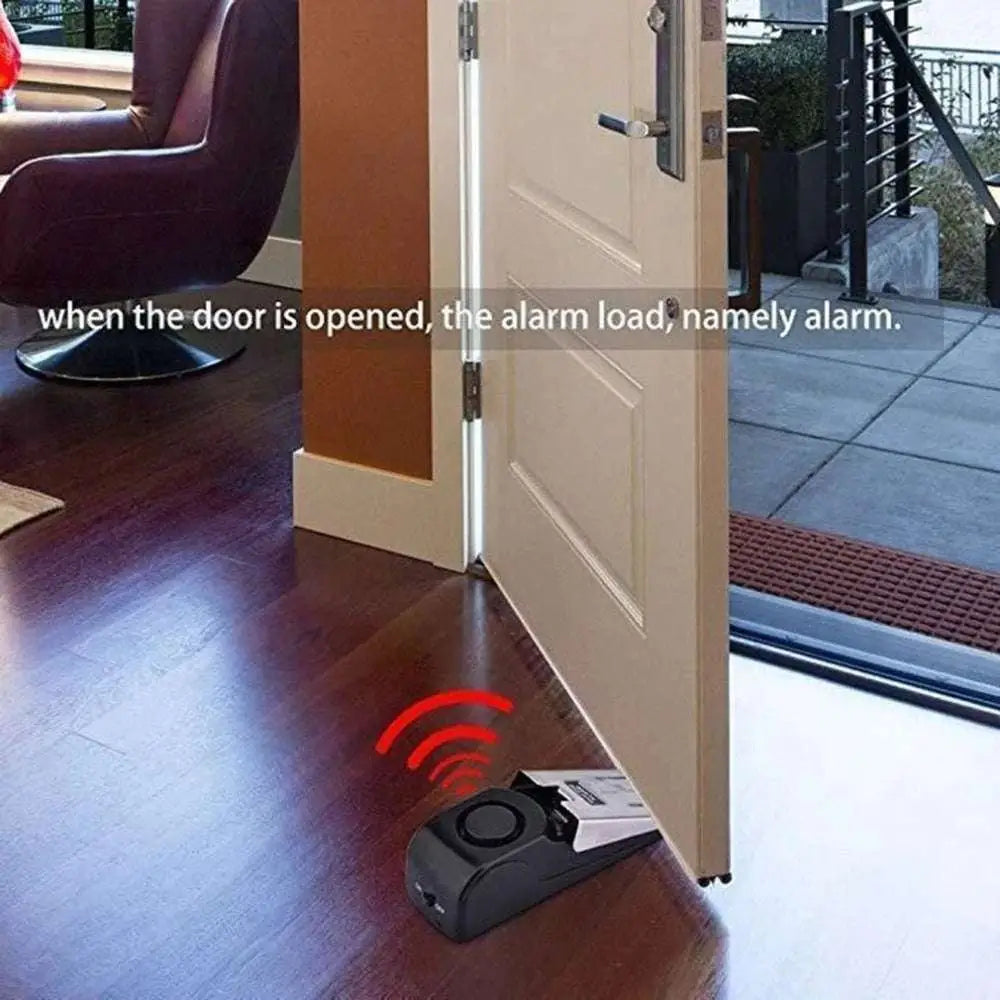 Black plastic 120db electronic burglar alarm wedge door stop with circular button and wireless signal indicator