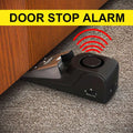 Black plastic 120db electronic burglar alarm wedge door stop with silver metallic wedge and adjustable sensitivity settings