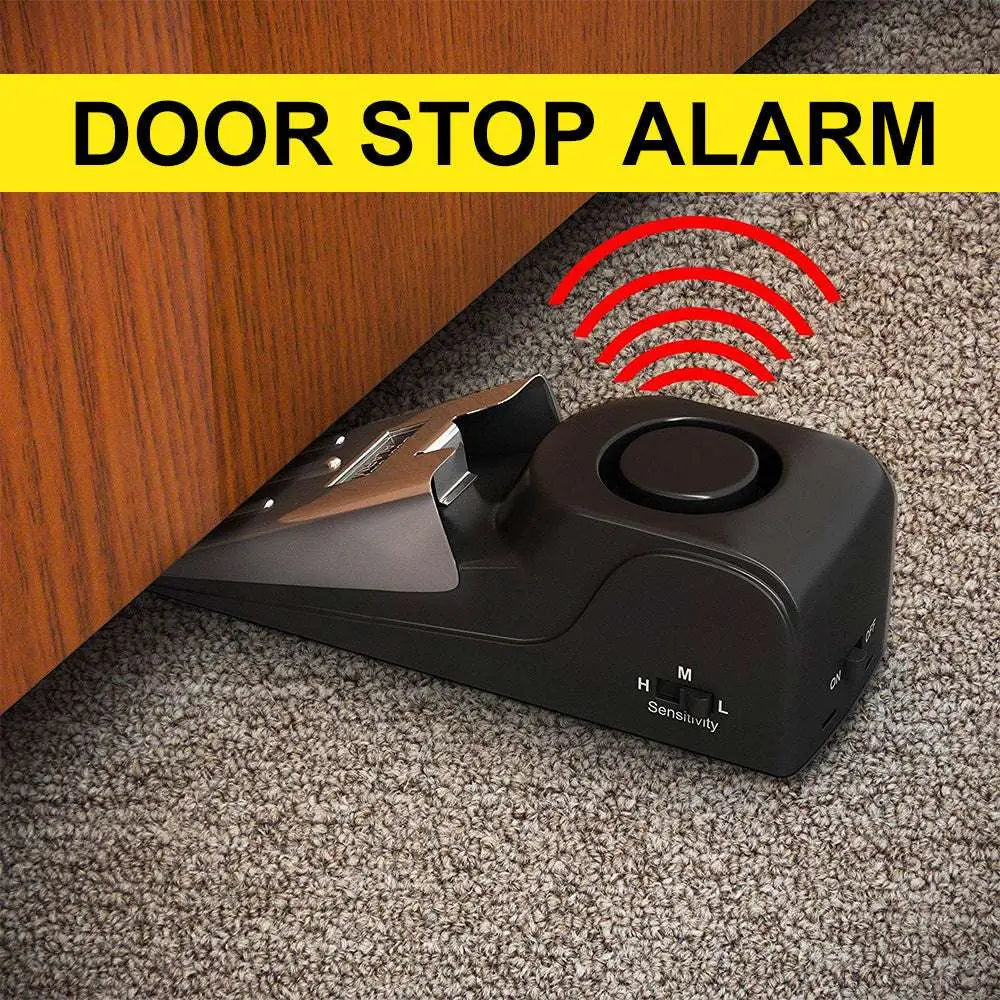 Black plastic 120db electronic burglar alarm wedge door stop with silver metallic wedge and adjustable sensitivity settings
