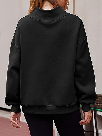 black oversized crewneck pullover sweatshirt solid color with relaxed fit and ribbed cuffs suitable for casual wear