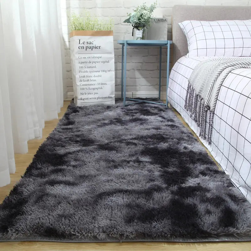 plush gray shaggy carpet floor mat featuring a gradient effect from dark to light gray made of soft plush carpet ideal for comfortable carpet floor use