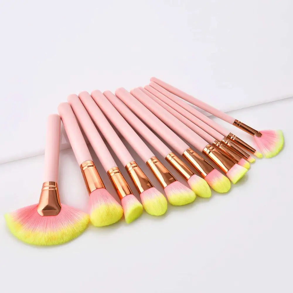 Set of 12pcs beauty makeup brushes with pink and yellow gradient bristles and rose gold ferrules with gold handles