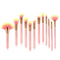 Set of 12pcs beauty makeup brushes with pink and gold handles and gradient yellow-to-pink bristles for professional use